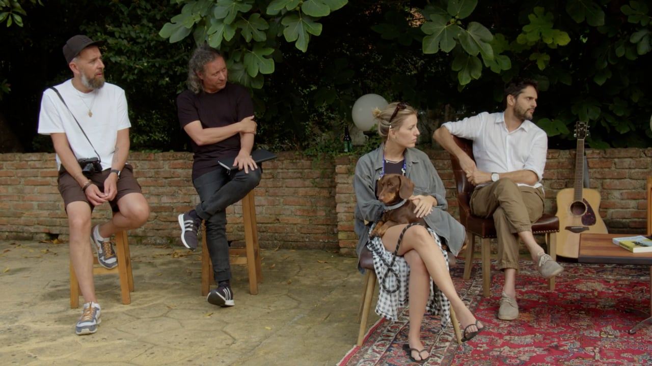 Think-tank conversation in a garden setting
